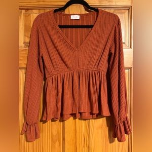 Rust color long sleeve blouse. Perfect condition. Only worn a few times.